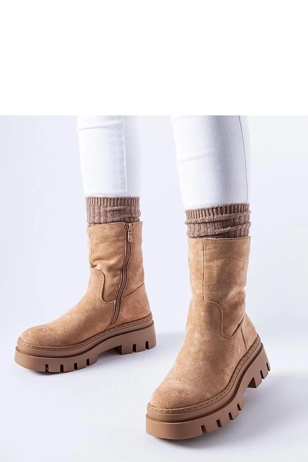 Brown insulated boots with a massive platform