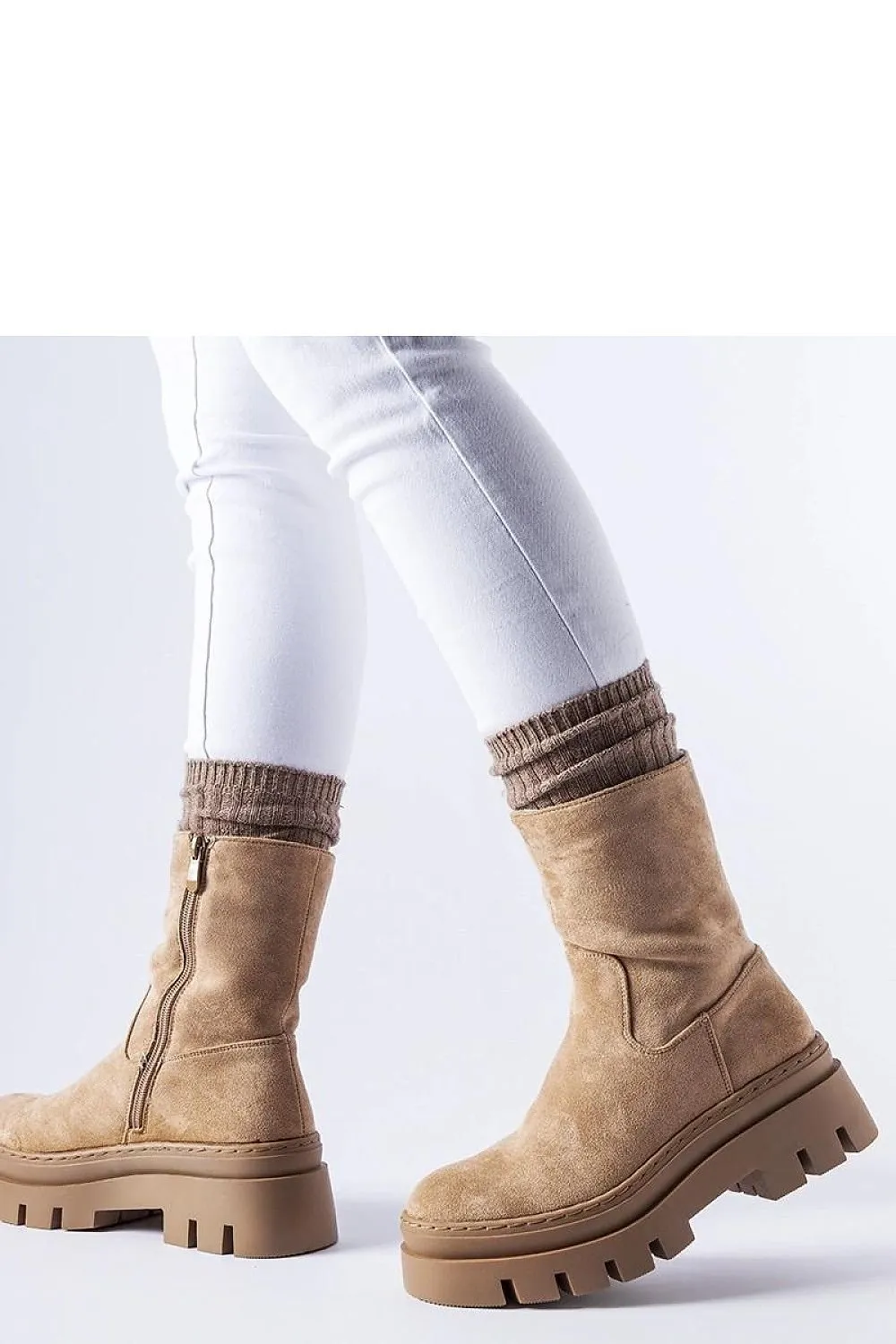 Brown insulated boots with a massive platform
