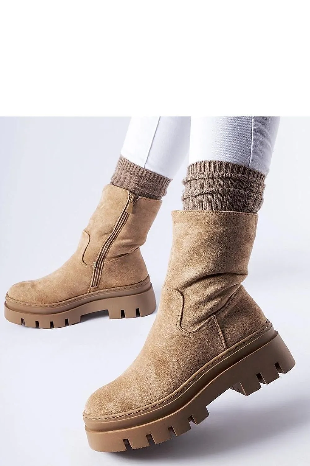 Brown insulated boots with a massive platform