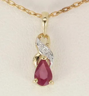 Pear Cut Ruby Gemstone with White Diamond Accents Designer Pendant